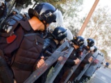 La gifle d’un policier constitue par principe un traitement dégradant